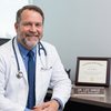 Dr. John H